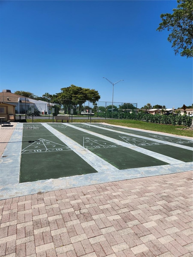 6670 Royal Palm Unit K 202, Pompano Beach, FL 33063 - view of property's community featuring shuffleboard and uncovered parking
