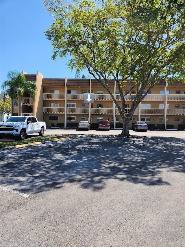 6670 Royal Palm Unit K 202, Pompano Beach, FL 33063 - view of property with uncovered parking
