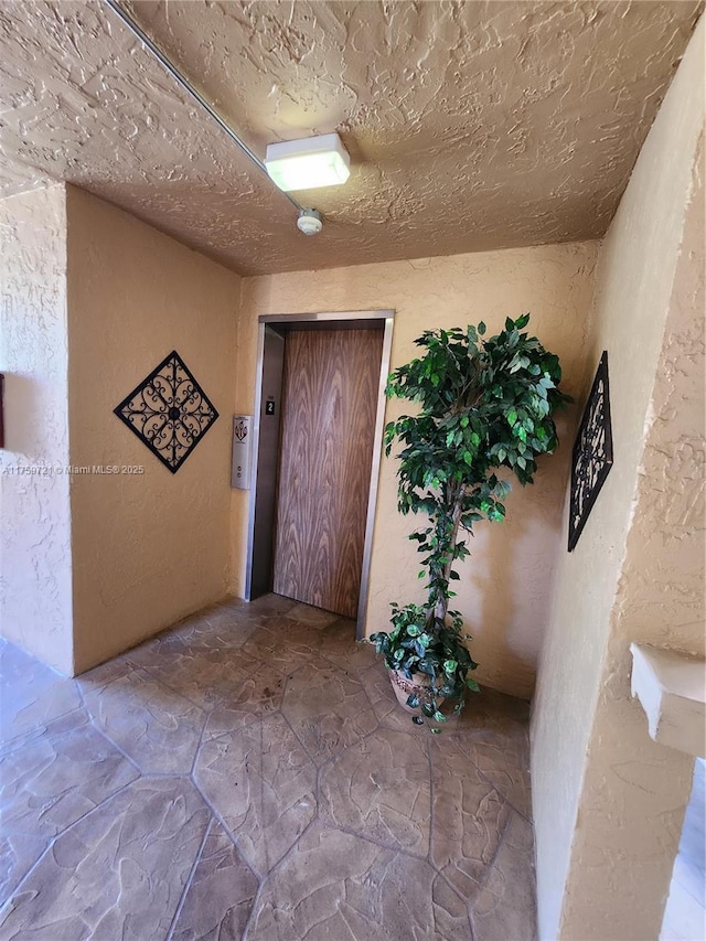 6670 Royal Palm Unit K 202, Pompano Beach, FL 33063 - property entrance featuring elevator