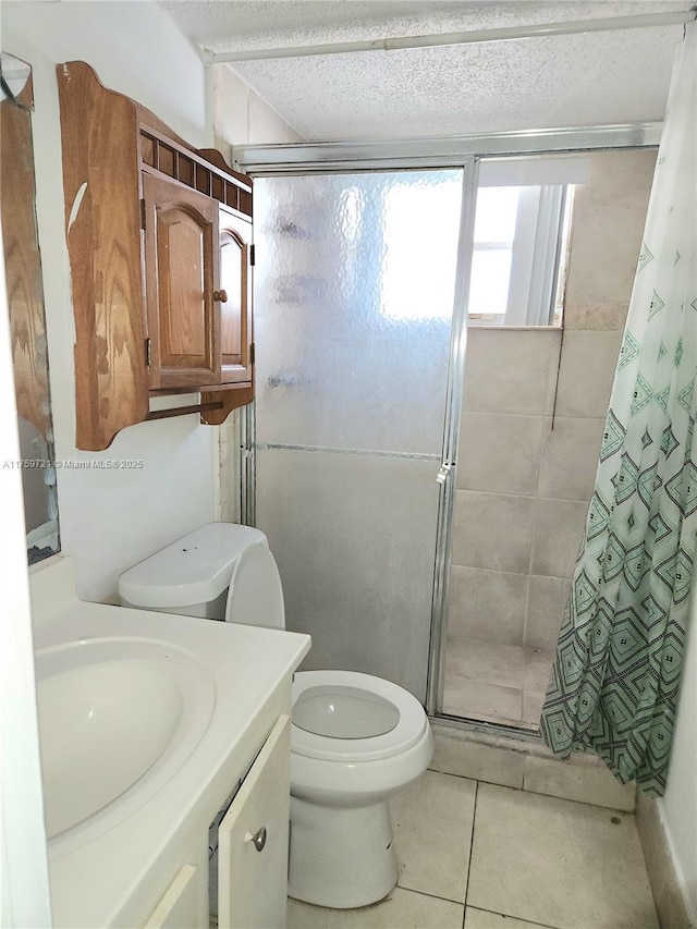 6670 Royal Palm Unit K 202, Pompano Beach, FL 33063 - bathroom featuring a shower stall, toilet, tile patterned flooring, vanity, and a textured ceiling