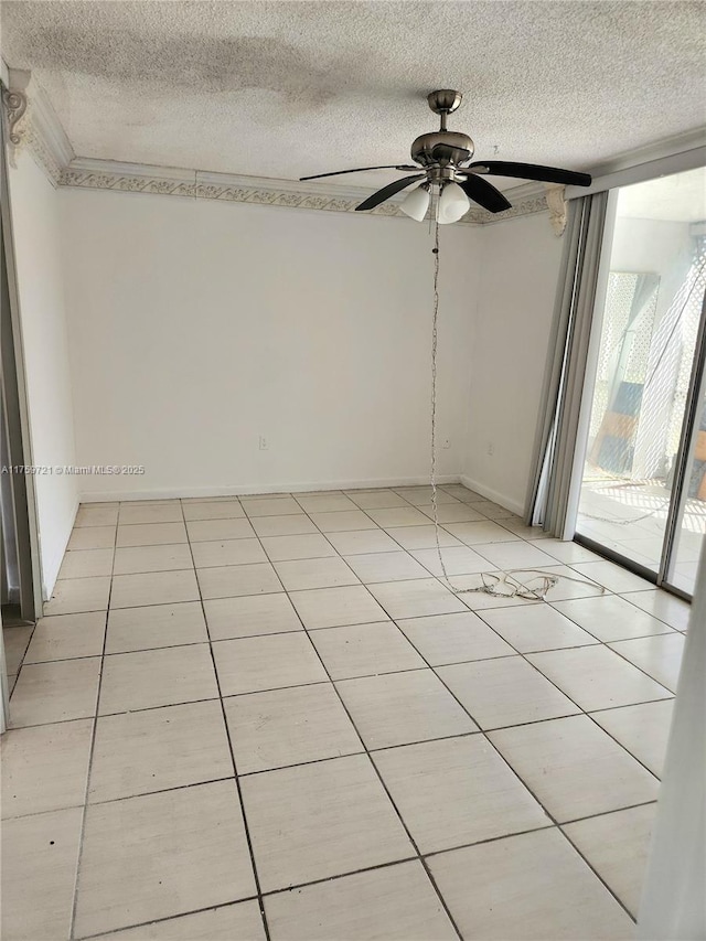 6670 Royal Palm Unit K 202, Pompano Beach, FL 33063 - spare room with light tile patterned floors, a textured ceiling, and ceiling fan