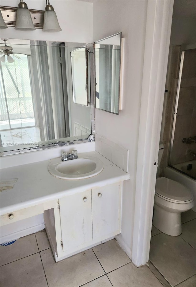 6670 Royal Palm Unit K 202, Pompano Beach, FL 33063 - full bathroom featuring tile patterned floors, vanity, toilet, and shower / washtub combination