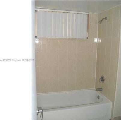 full bathroom with bathing tub / shower combination