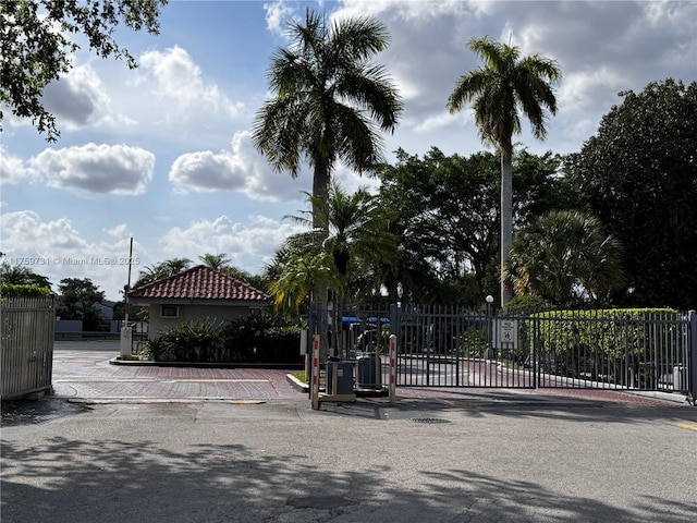 view of gate with fence