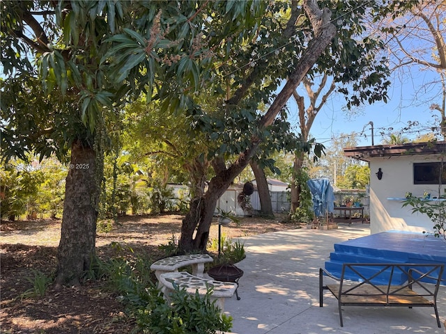 view of patio with fence