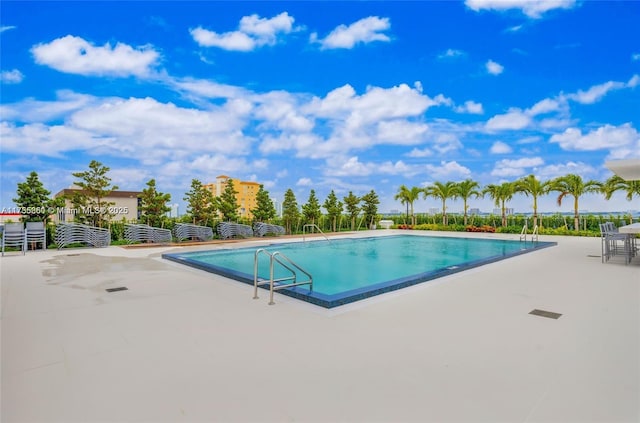 pool with a patio