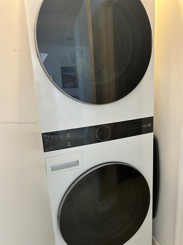3610 Yacht Club Dr Unit 1510, Aventura, FL 33180 - room details featuring stacked washer and clothes dryer