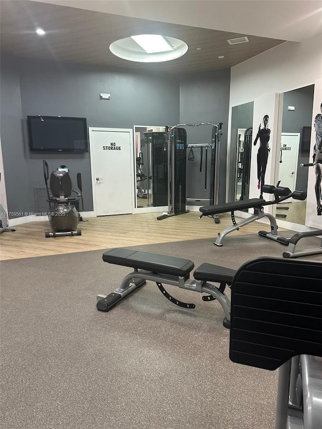 3610 Yacht Club Dr Unit 1510, Aventura, FL 33180 - workout area with visible vents, baseboards, and wood finished floors
