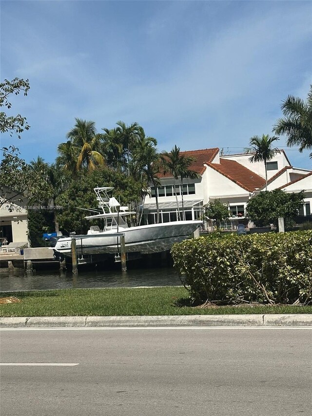 3610 Yacht Club Dr Unit 1510, Aventura, FL 33180 - view of front of property with a dock and a water view