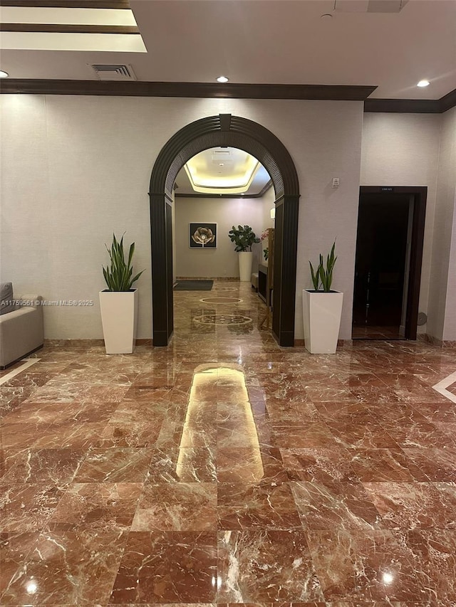 3610 Yacht Club Dr Unit 1510, Aventura, FL 33180 - hall with marble finish floor, visible vents, arched walkways, and recessed lighting