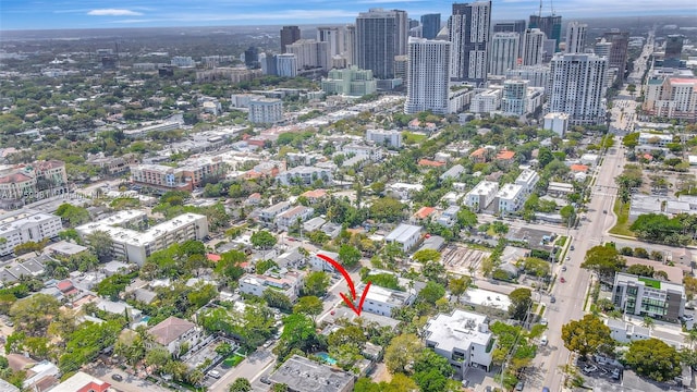 birds eye view of property with a view of city