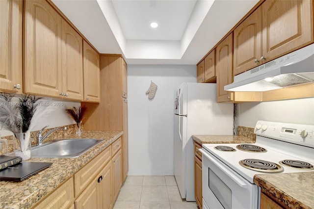 kitchen featuring light tile patterned floors, white range with electric cooktop, light brown cabinetry, under cabinet range hood, and a sink