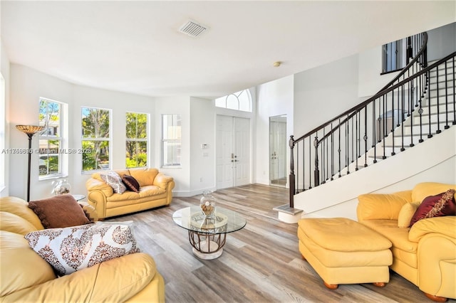 4951 SW 158th Ave, Miramar, FL 33027 - living room featuring stairway and wood finished floors