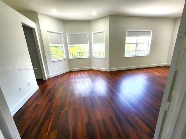 4951 SW 158th Ave, Miramar, FL 33027 - empty room featuring dark wood-style flooring and recessed lighting