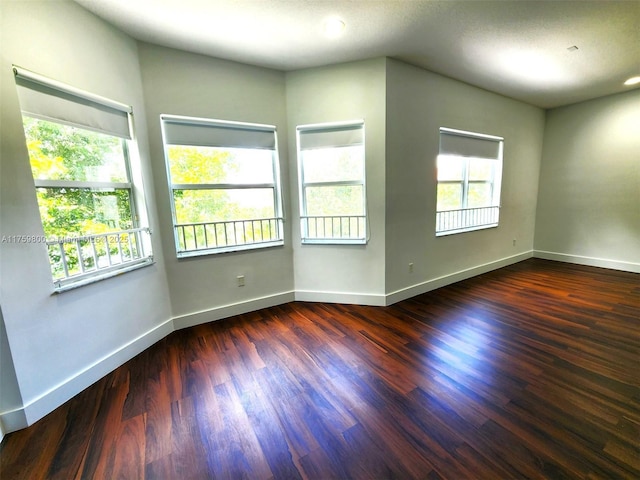 4951 SW 158th Ave, Miramar, FL 33027 - empty room featuring baseboards and wood finished floors