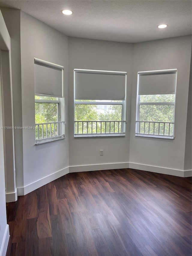 4951 SW 158th Ave, Miramar, FL 33027 - empty room featuring dark wood-style flooring and recessed lighting