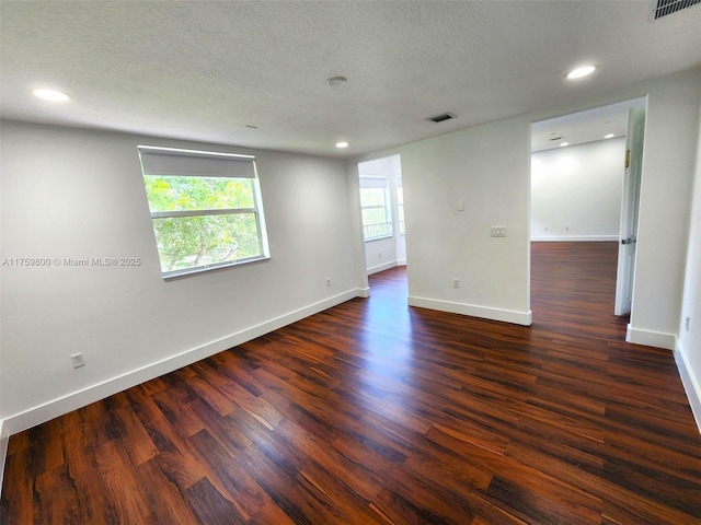 4951 SW 158th Ave, Miramar, FL 33027 - empty room with recessed lighting, dark wood-type flooring, and a textured ceiling