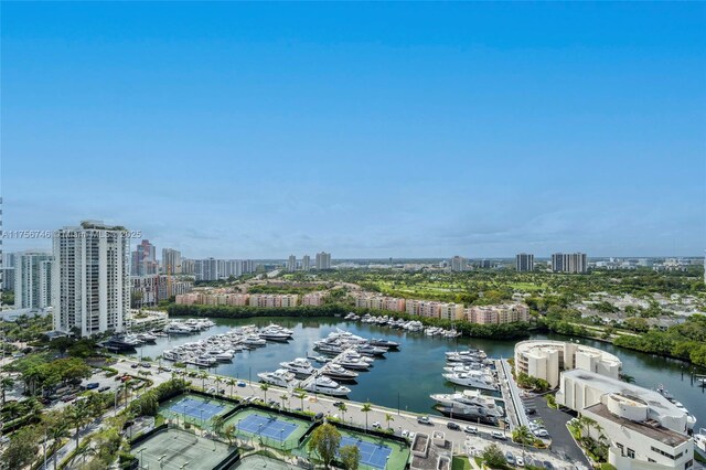 bird's eye view with a view of city and a water view