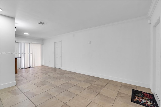 2810 NW 171st Ter, Miami Gardens, FL 33056 - spare room with crown molding and light tile patterned flooring