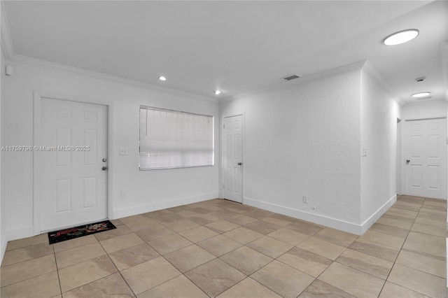 2810 NW 171st Ter, Miami Gardens, FL 33056 - foyer entrance with crown molding, light tile patterned floors, and recessed lighting