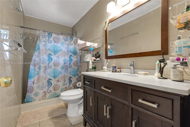 full bath with a shower with curtain, toilet, tile walls, and vanity