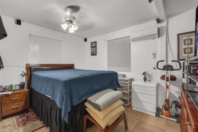 bedroom with light tile patterned floors, a ceiling fan, and a wall mounted AC