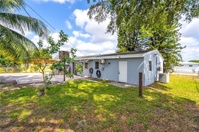 2810 NW 171st Ter, Miami Gardens, FL 33056 - rear view of house with stucco siding