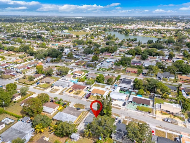 2810 NW 171st Ter, Miami Gardens, FL 33056 - aerial view of property and surrounding area with a nearby body of water and nearby suburban area