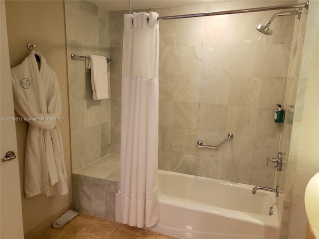 bathroom with tile patterned flooring and shower / bath combination with curtain