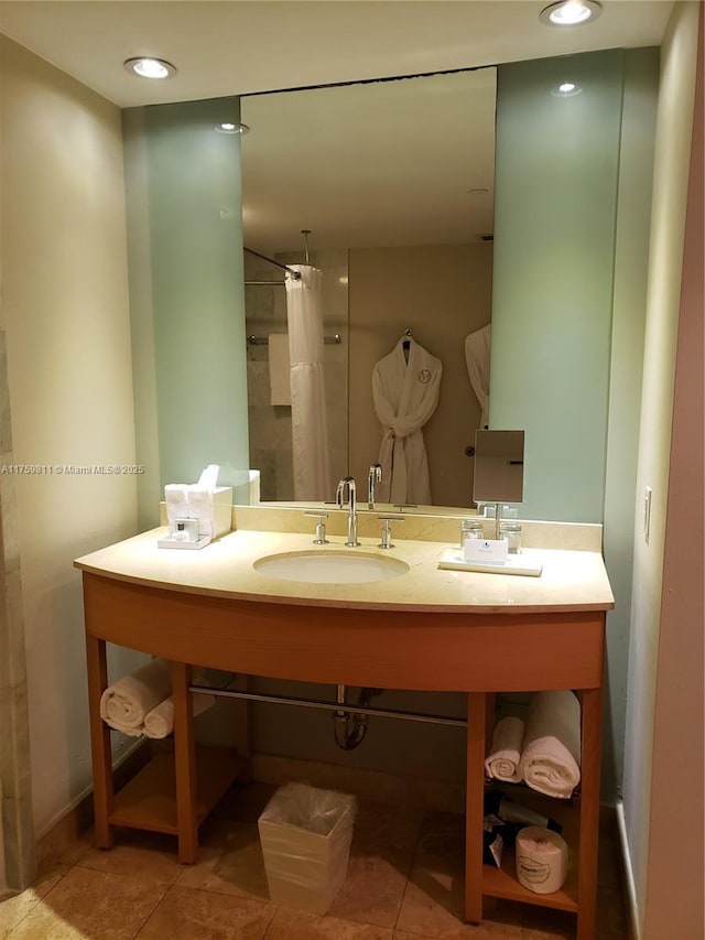 bathroom with curtained shower, recessed lighting, vanity, and tile patterned floors