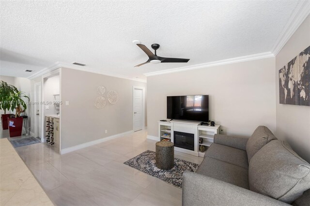 17 Boxwood Rd, Hollywood, FL 33021 - living area featuring visible vents, a textured ceiling, crown molding, and ceiling fan