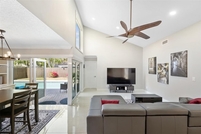 17 Boxwood Rd, Hollywood, FL 33021 - living room with ceiling fan with notable chandelier, visible vents, and high vaulted ceiling