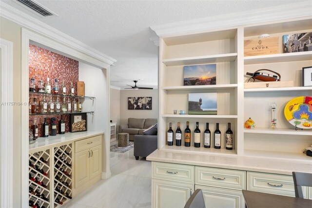 17 Boxwood Rd, Hollywood, FL 33021 - bar featuring a ceiling fan, a textured ceiling, and crown molding