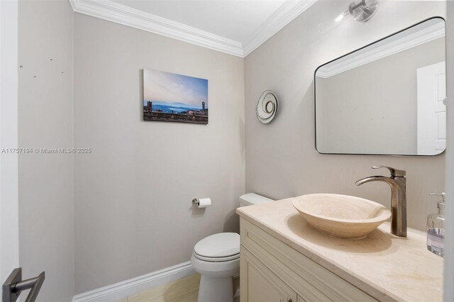 17 Boxwood Rd, Hollywood, FL 33021 - bathroom with baseboards, toilet, ornamental molding, and vanity