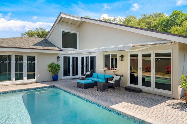 17 Boxwood Rd, Hollywood, FL 33021 - rear view of house with french doors, outdoor lounge area, stucco siding, and a patio area