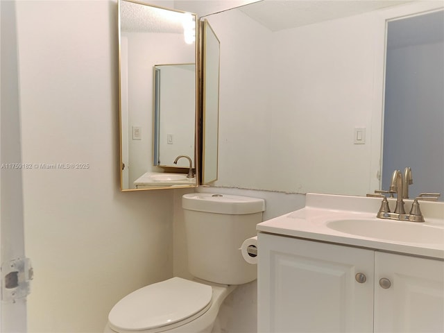 bathroom featuring a sink and toilet