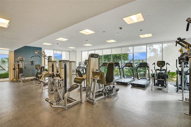 workout area featuring a wall of windows