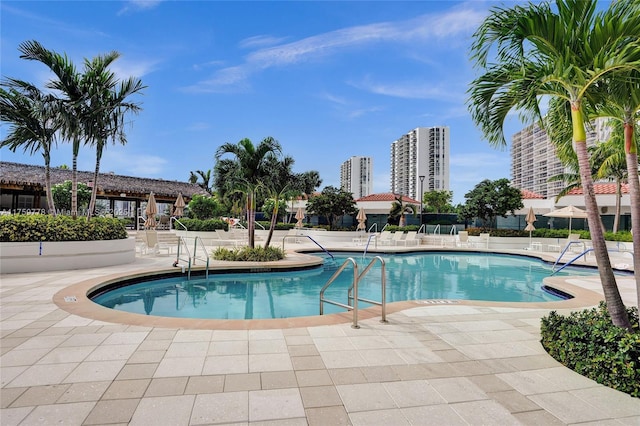 community pool with a patio