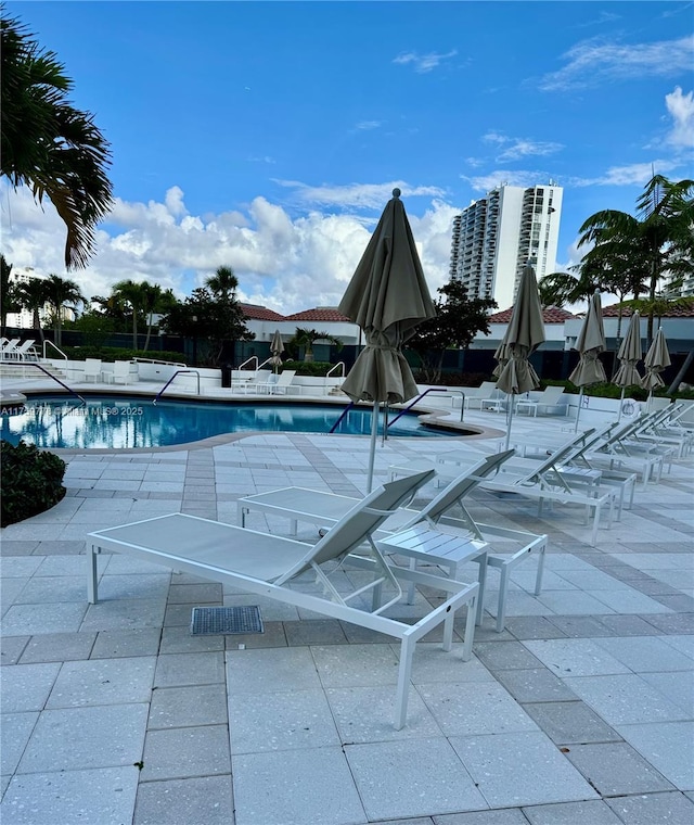 community pool featuring a patio