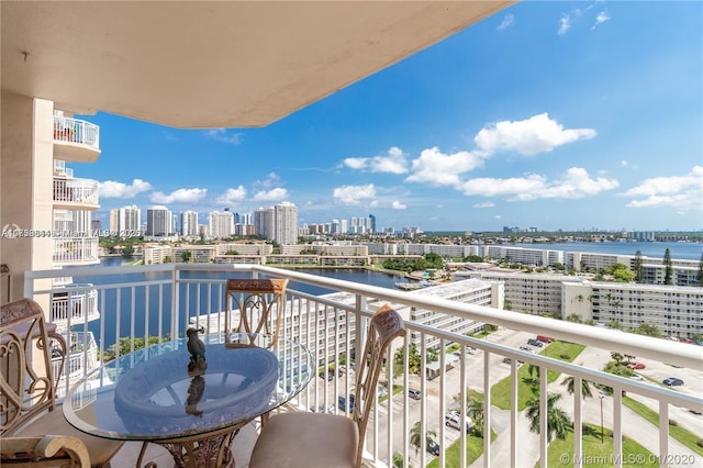 balcony with a city view and a water view