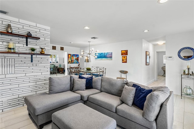 living area with recessed lighting, visible vents, and light wood-style floors