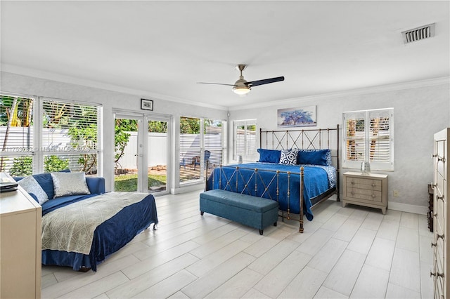 bedroom with access to exterior, visible vents, crown molding, light wood-style flooring, and a ceiling fan