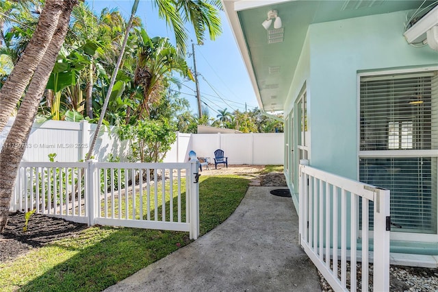 view of yard featuring a patio area and a fenced backyard