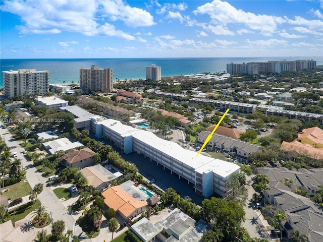 aerial view featuring a water view and a city view