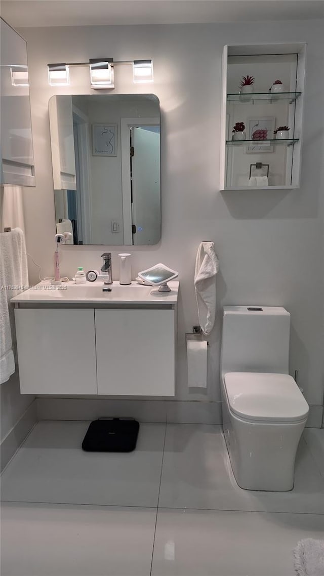 half bath with toilet and vanity