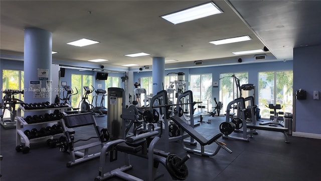 exercise room featuring baseboards