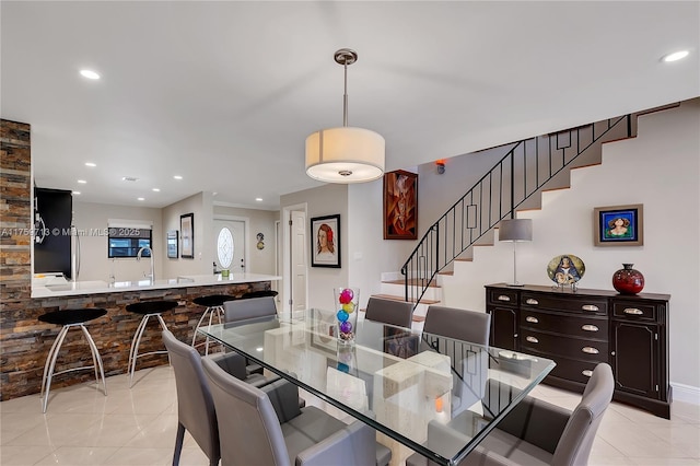 dining space featuring stairway, light tile patterned flooring, and recessed lighting