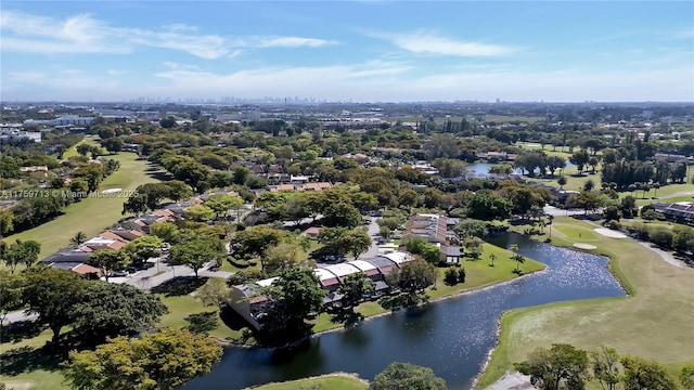 bird's eye view with a water view and view of golf course