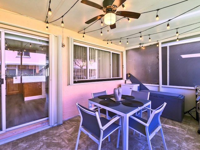 view of patio / terrace with outdoor dining area and ceiling fan