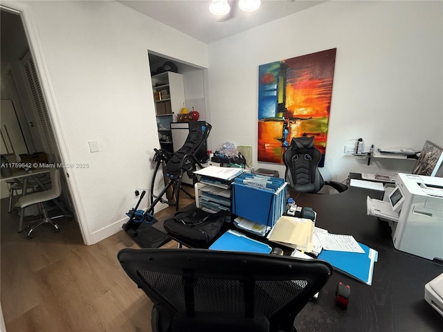 office area featuring wood finished floors and baseboards